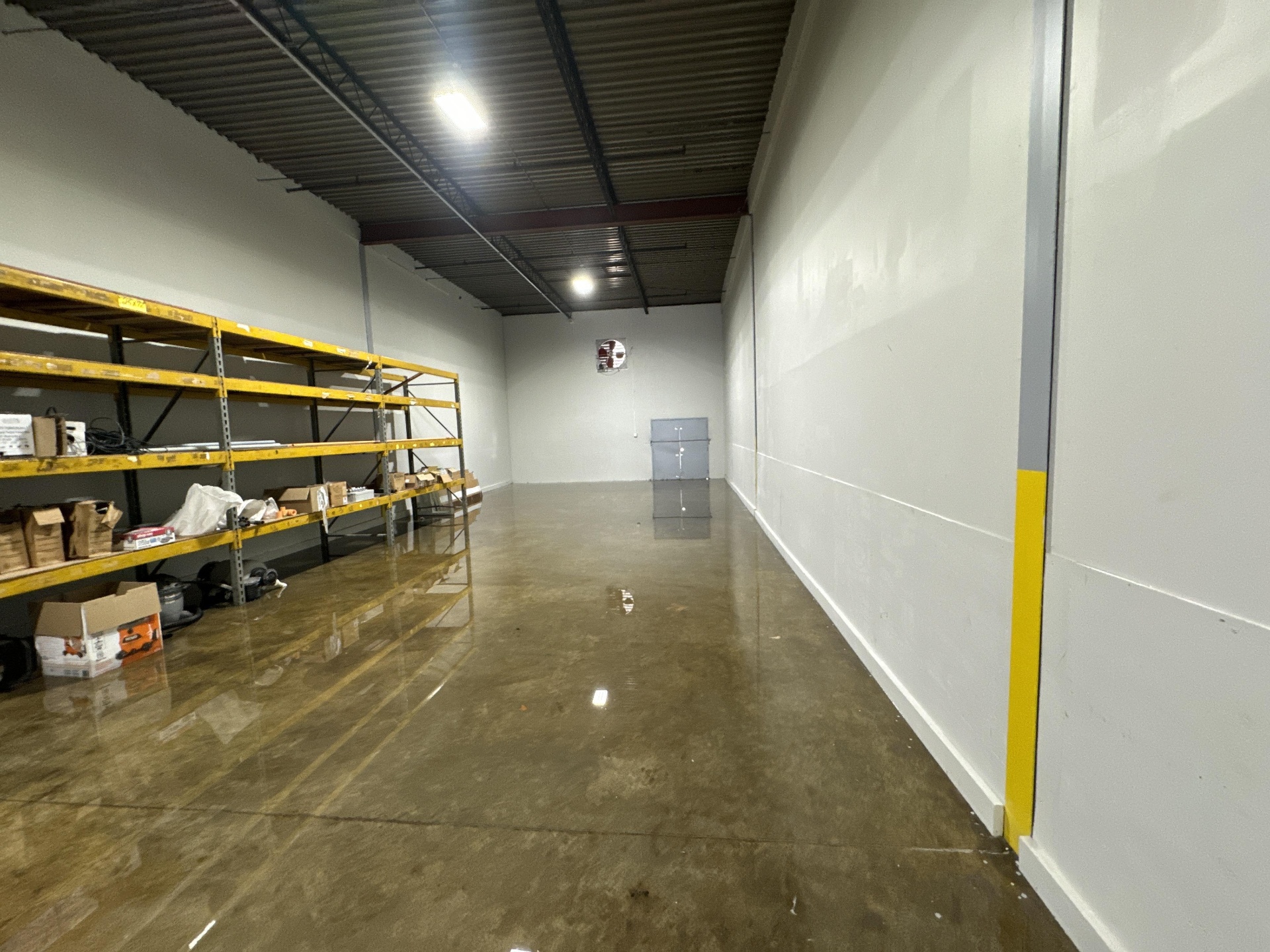 Warehouse shelves flooded after a storm event in Knoxville